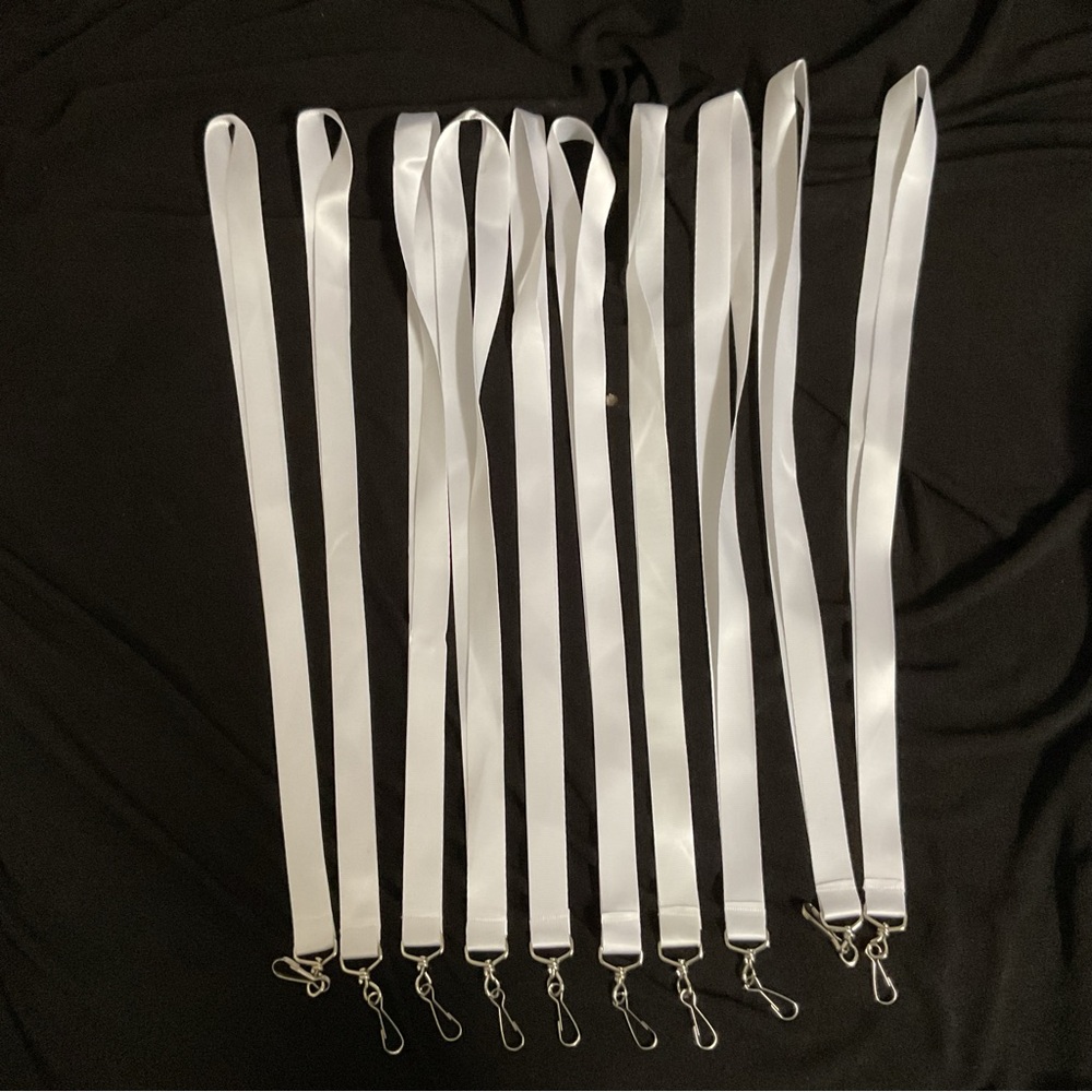 Sold in sets of (10) @ $10ea. or $99./140 White Lanyards/Clips for badges/keys